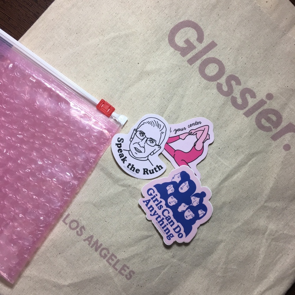 Glossier tote with stickers
